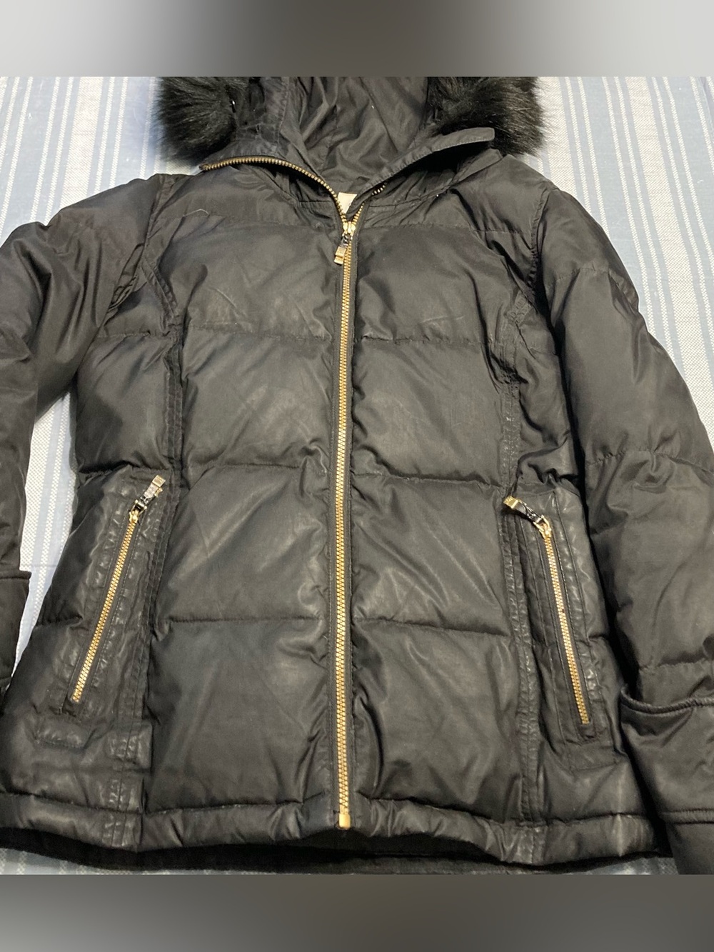 Calvin Klein black hooded puffer jacket with faux fur.
